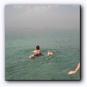 Cannot really swim like that, your feet are being pushed out of the water